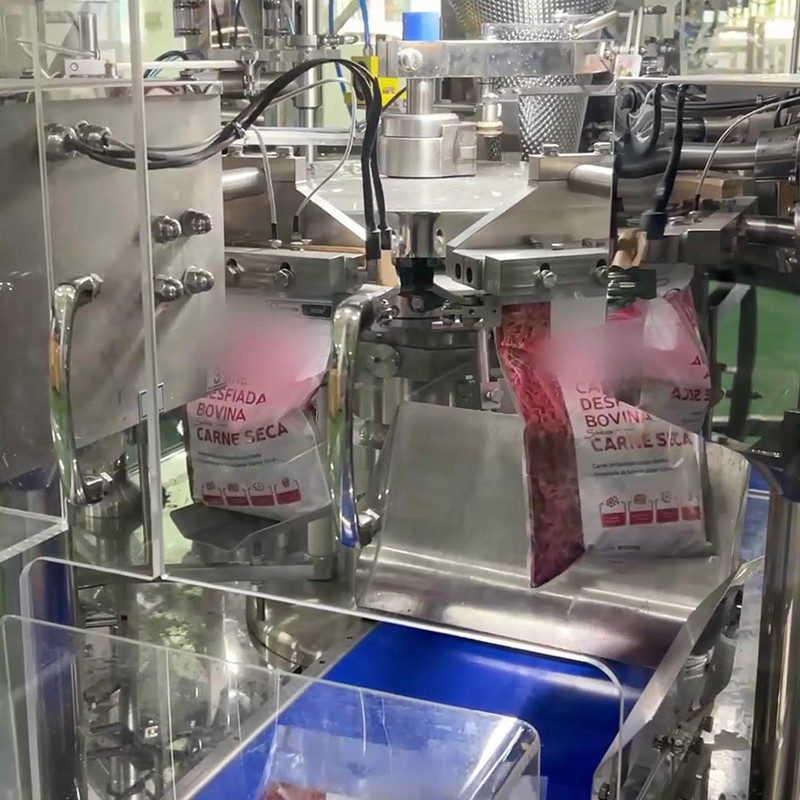 Spezialisierte effiziente Dehydrierte Rindfleisch Nuggets Quantitative Beutel Verpackungsmaschine bereit zum Essen Lebensmittel Rindfleisch Mehrköpfige Wieger