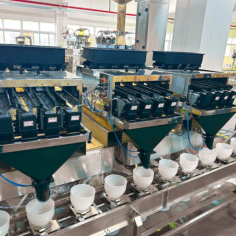 Multimaterialien 2,5 kg Verpackungsmaschine für Haustierfutter mit Mehrkopf-Wagen-Linien-Wagen für Ziplock-Doypack-Tasche-Verpackung