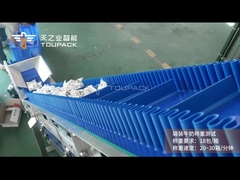 TOUPACK System zur Gewichtung und Kartonisierung von Säckmilch